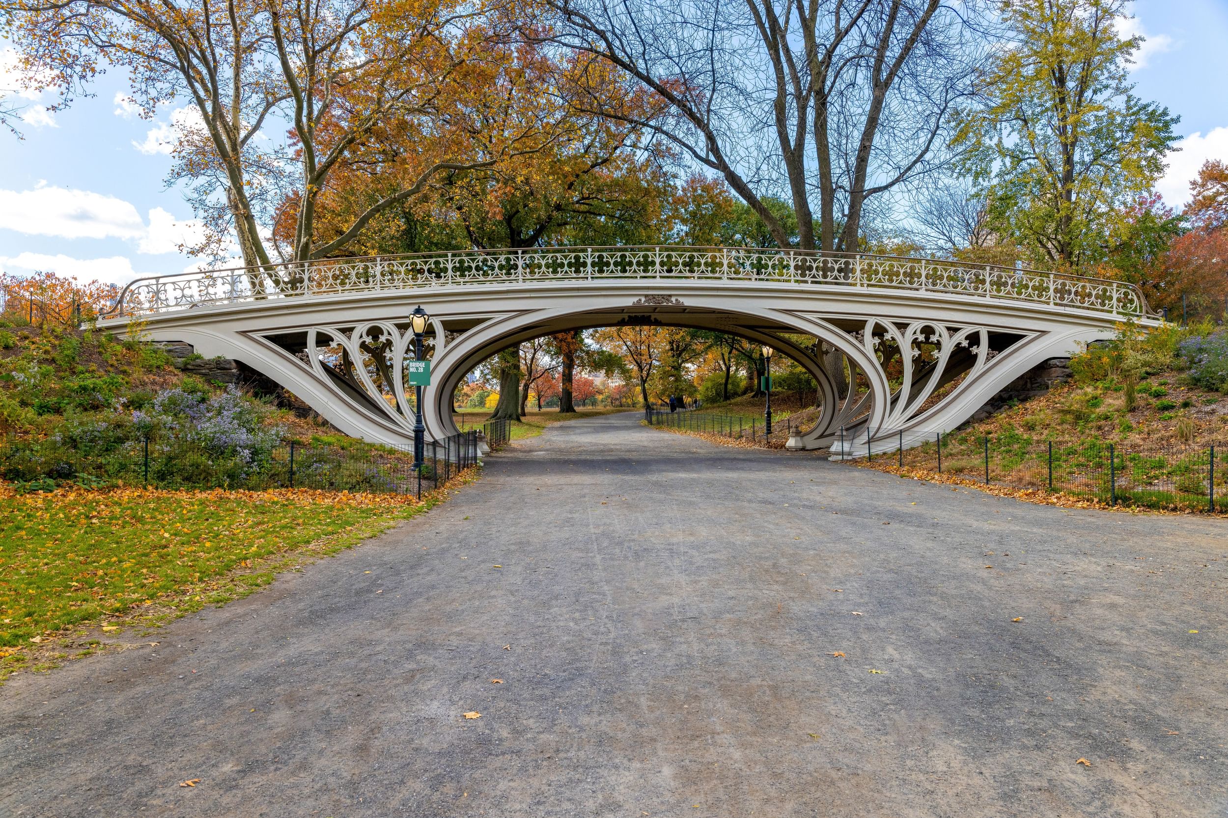 Ornate Gothic-inspired bridge located north side of the Reservoir in Central Park NYC.