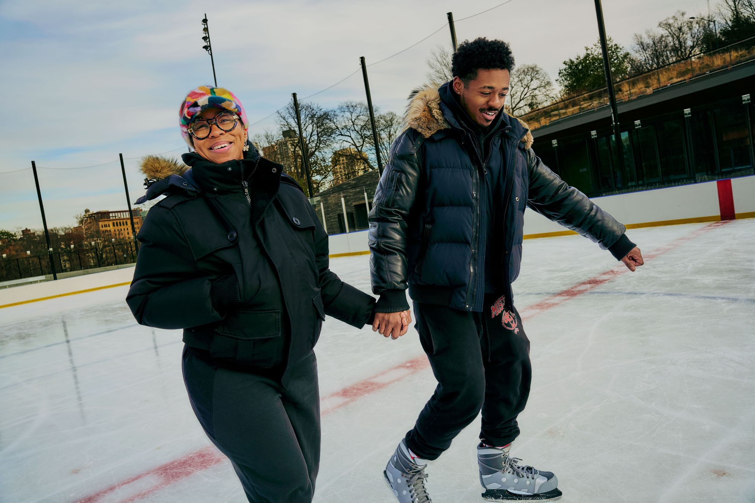 Stormy McNair smiling on skates at the Gottesman Ice Rink in the Davis Center