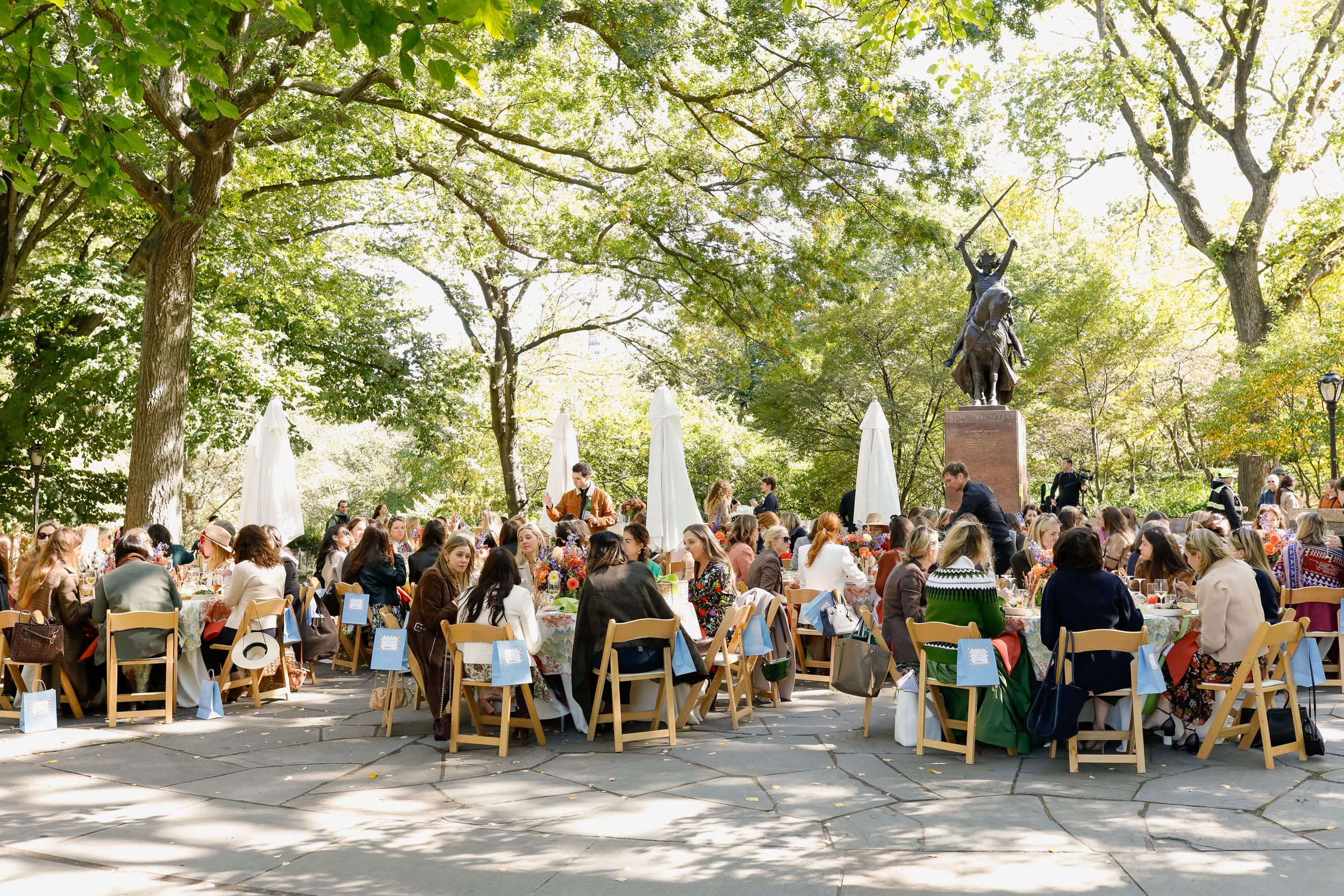 People enjoying a luncheon at King Jagiello Plaza