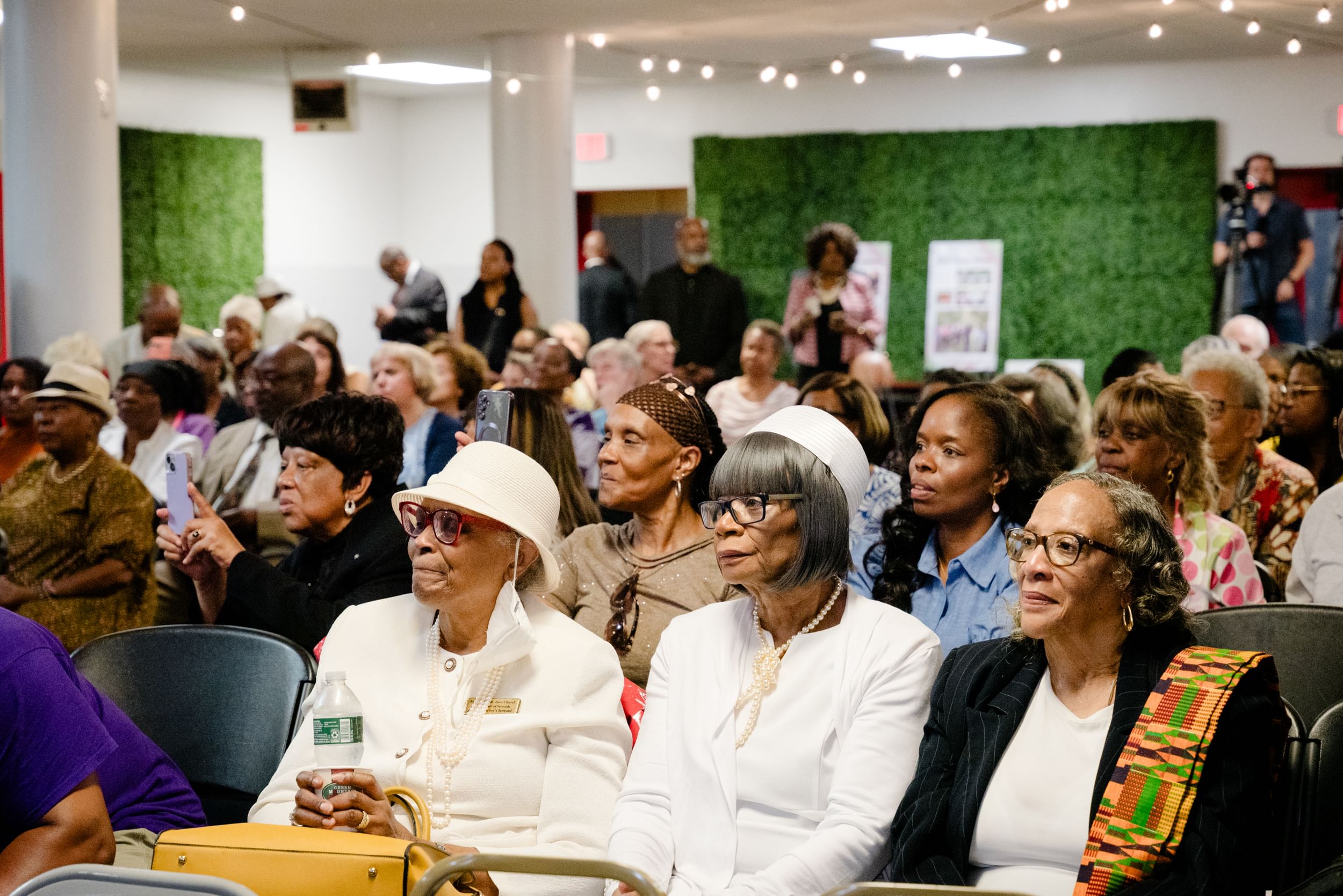 Members of the audience of the panel discussion in Mother AME Zion Church's social hall.