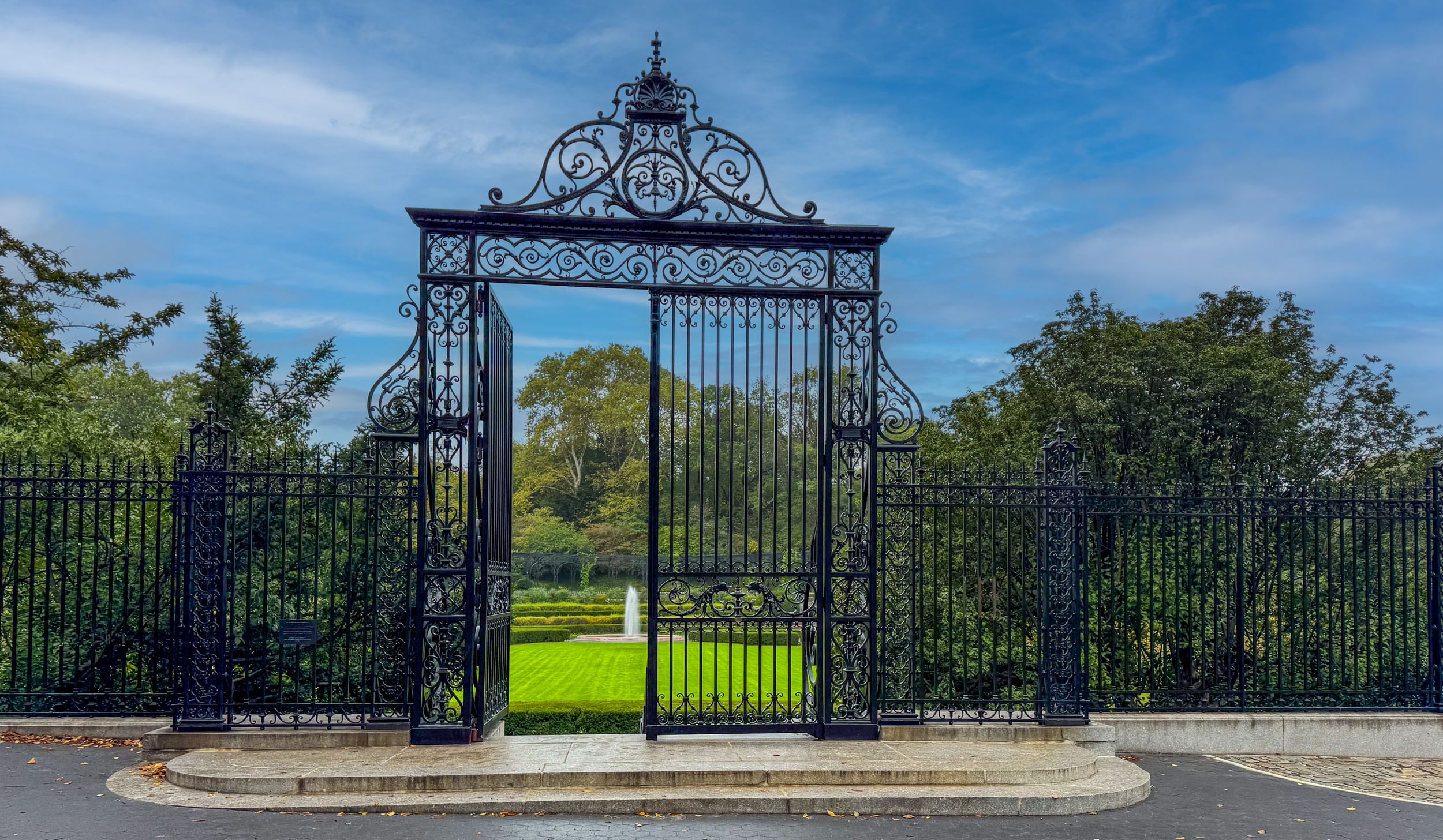 The wrought-iron gate leading to the center Italianate garden