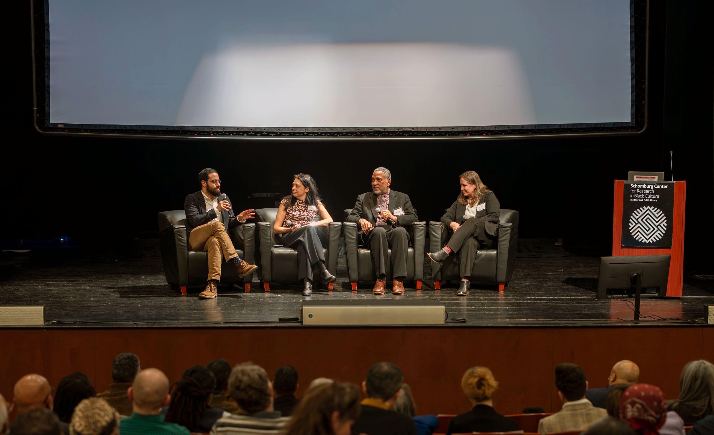 On stage at the Schomburg, from left to right: Salmaan Khan, Lane Addonizio, John Reddick, Jessica MacLean.